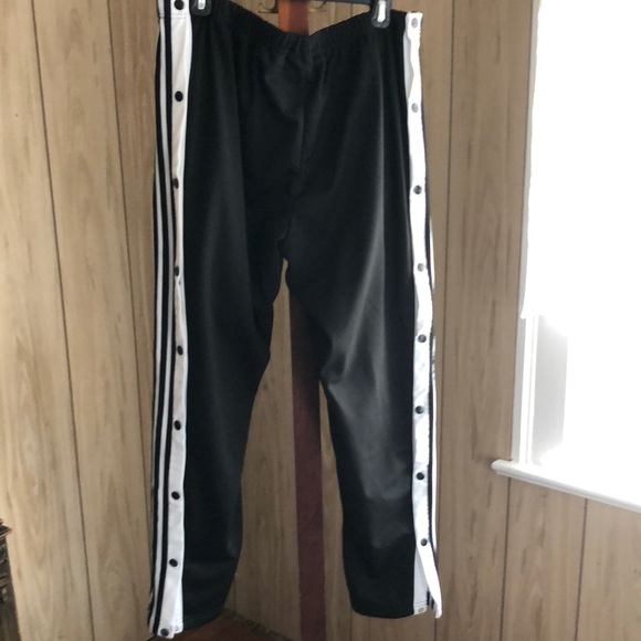 adidas Other - Black Adidas athletic pants. Snaps on outer pant legs.